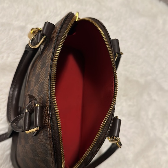 Louis Vuitton Alma Bb less than 2 years old with minor wear and tear - Picture 2 of 4